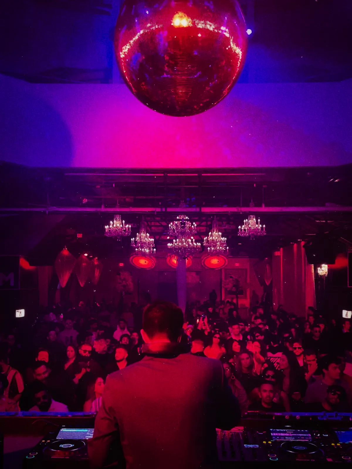 Disco ball over the crowd at Grand Bizarre
