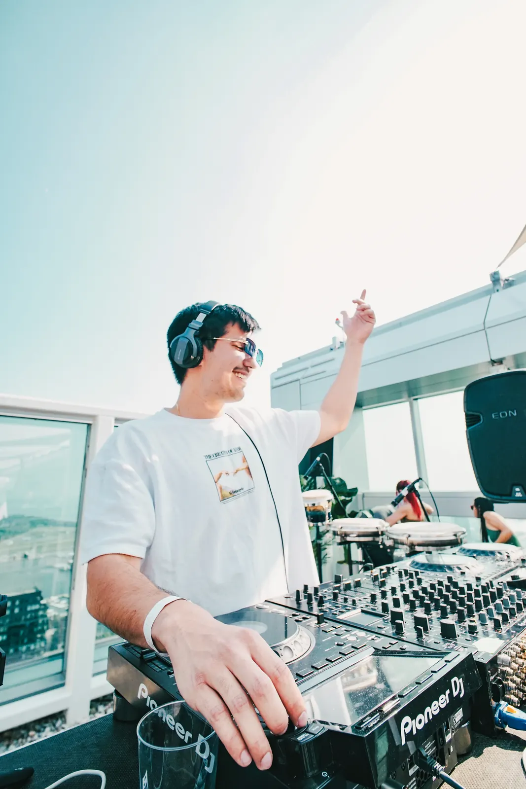 Azul DJing at a daytime rooftop party