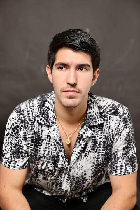 Press photo: Azul seated